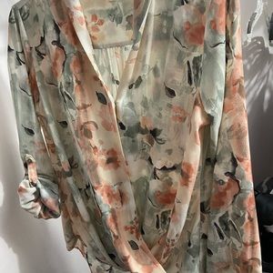 Flower blouse; sleeves could be worn long or folded up.